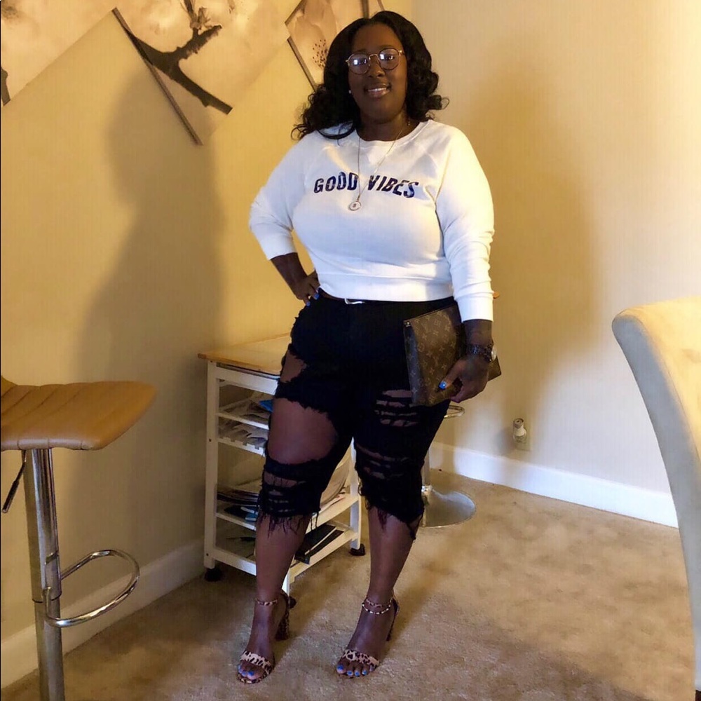 Black distressed Bermuda shorts